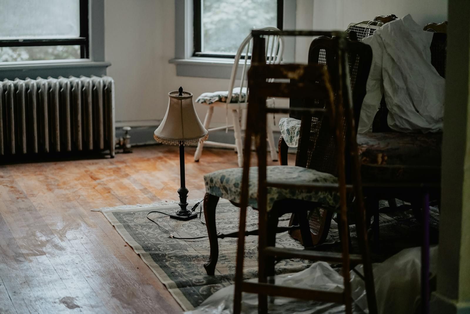 A back room filled with old furniture and odds and ends